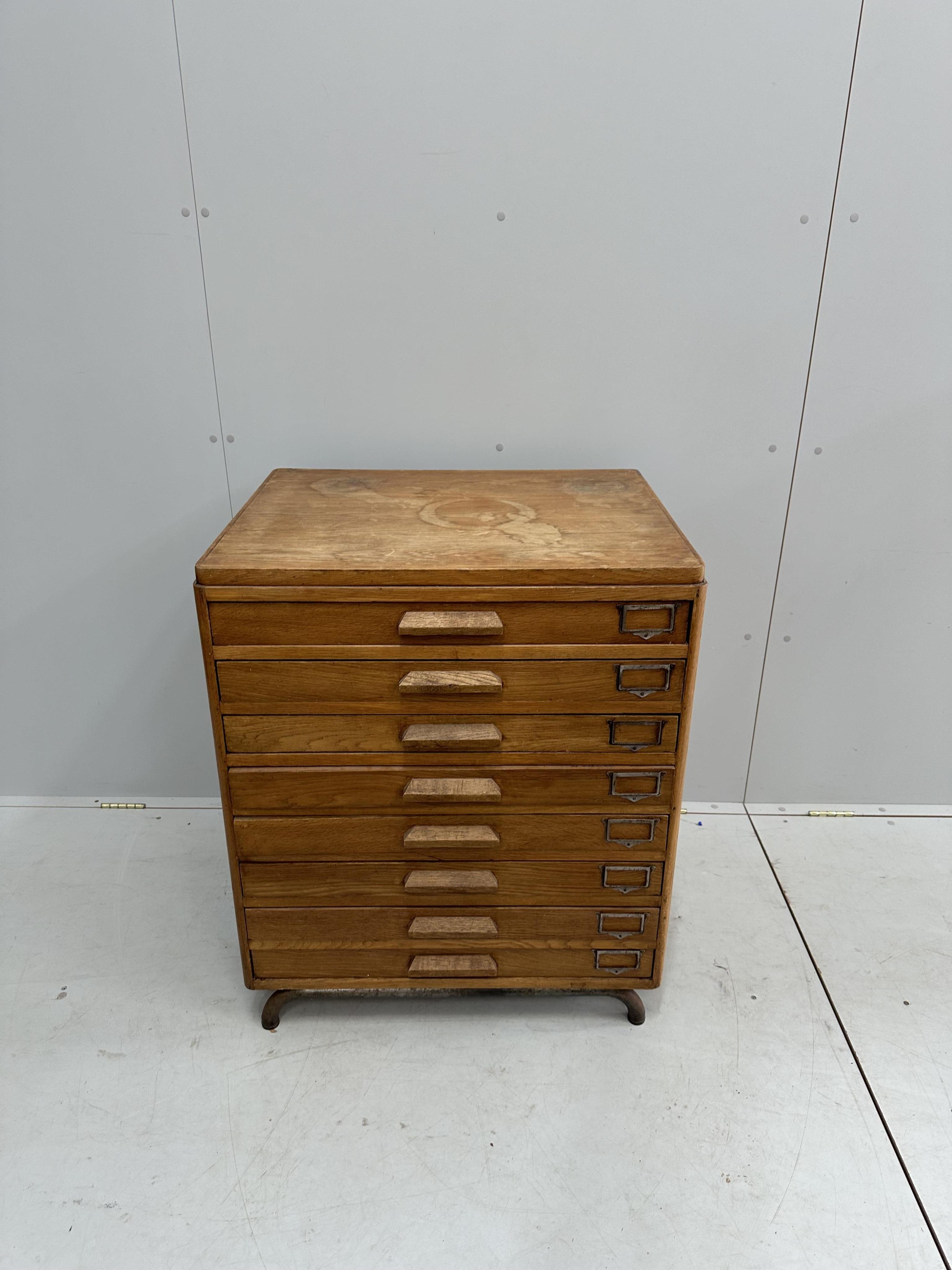 A mid century oak eight drawer plan chest, width 74cm, depth 59cm, height 88cm. Condition - fair